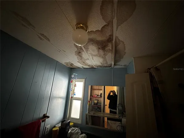 a bathroom with a toilet and a sink