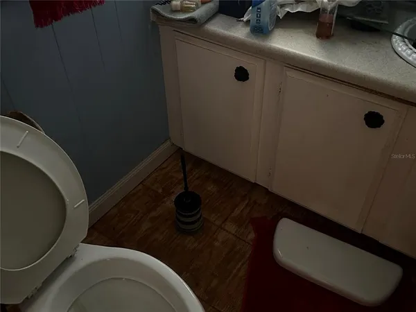 a bathroom with a sink and mirror