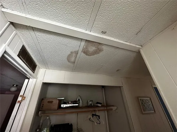 a view of utility room with windows