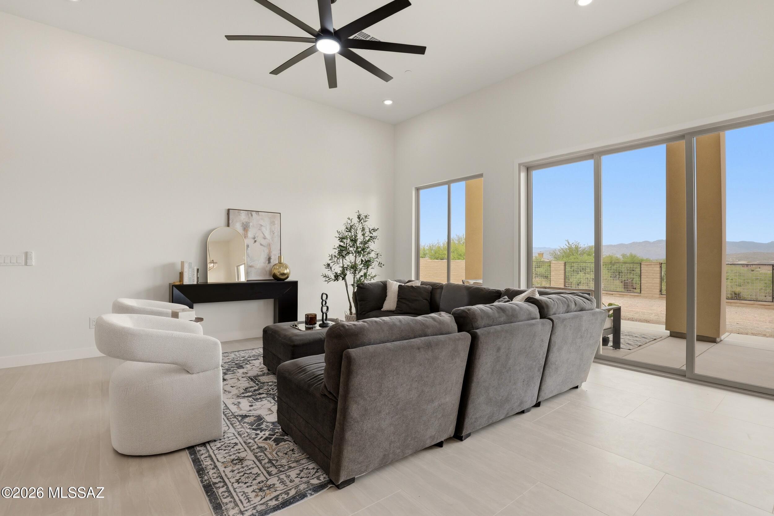 14527 East Sands Ranch Road Vail, AZ 85641 - Photo 14 of 48 a living room with furniture and a large window