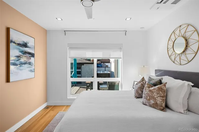 a view of a storage and utility room with washer and dryer