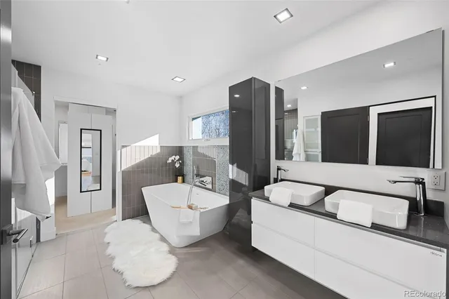 a view of a patio with couple of chairs