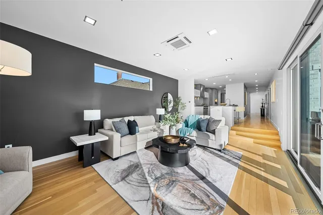 a view of a patio with a table and chairs