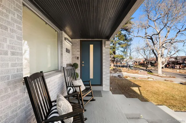 a kitchen with stainless steel appliances a sink stove and cabinets