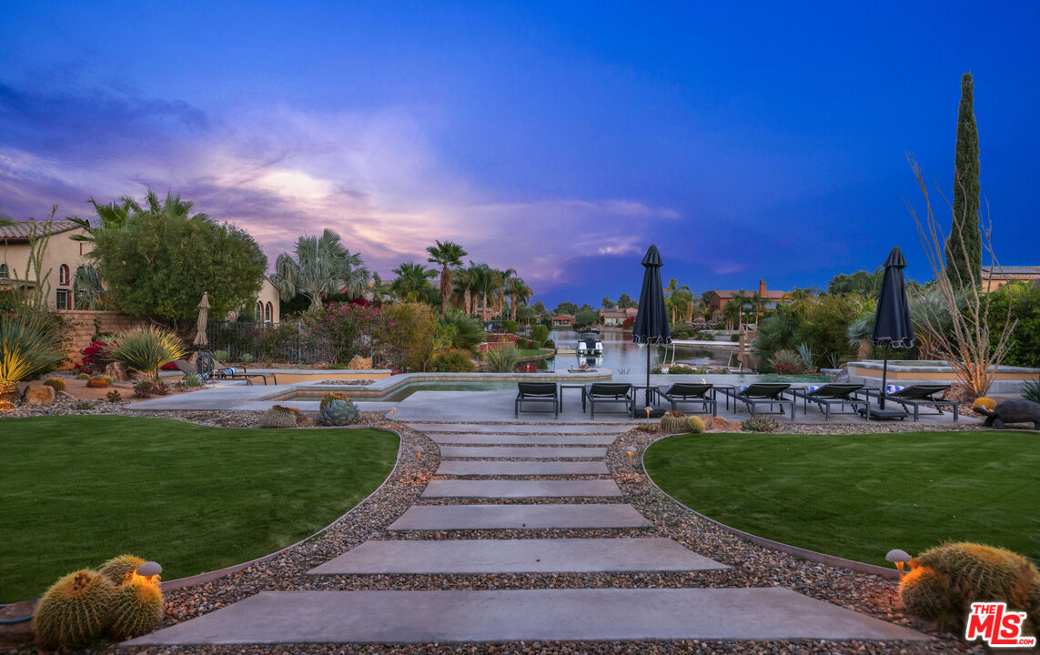 98 Via Santo Tomas Drive Rancho Mirage, CA 92270 - Photo 11 of 45 a garden view with a seating space
