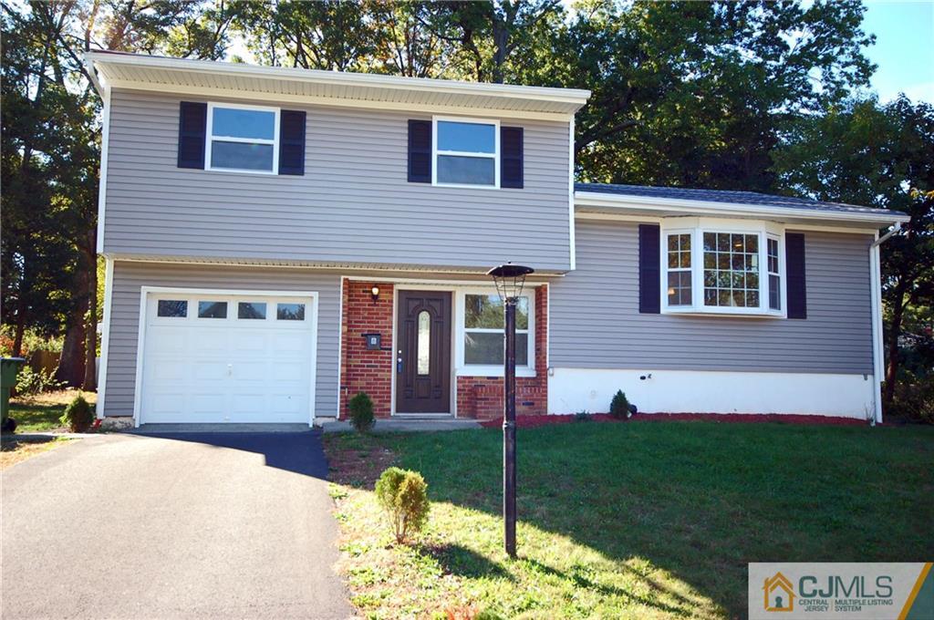 8 Estok Road Edison, NJ 08817 - Photo 1 of 22 a front view of a house with a yard and porch