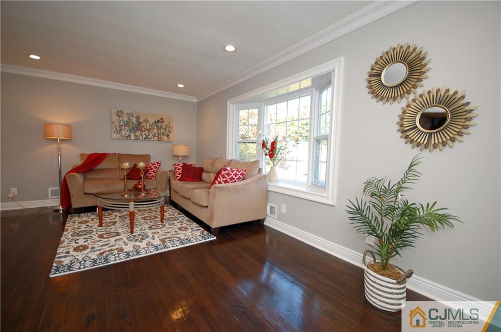 8 Estok Road Edison, NJ 08817 - Photo 3 of 22 a living room with furniture and a potted plant