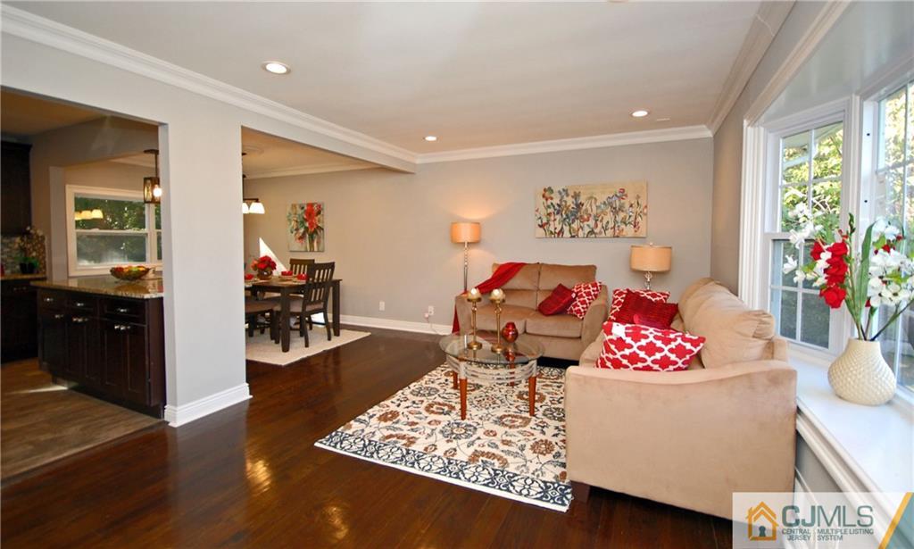 8 Estok Road Edison, NJ 08817 - Photo 4 of 22 a living room with furniture and a table