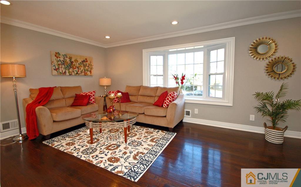8 Estok Road Edison, NJ 08817 - Photo 5 of 22 a living room with furniture and wooden floor