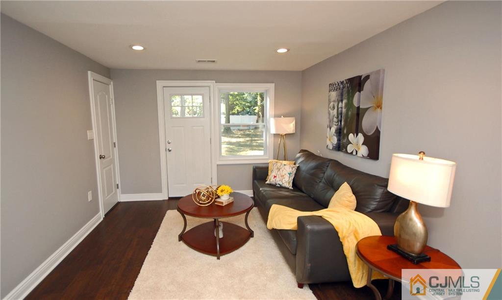 8 Estok Road Edison, NJ 08817 - Photo 8 of 22 a living room with furniture and a window