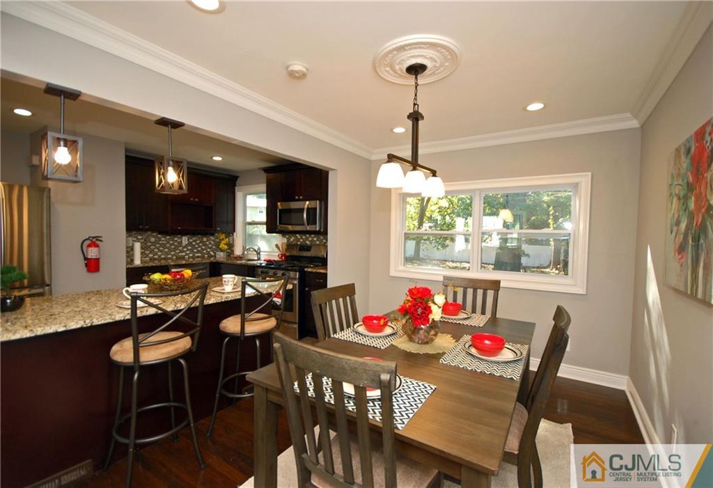 8 Estok Road Edison, NJ 08817 - Photo 9 of 22 a view of a dining room with furniture window and outside view