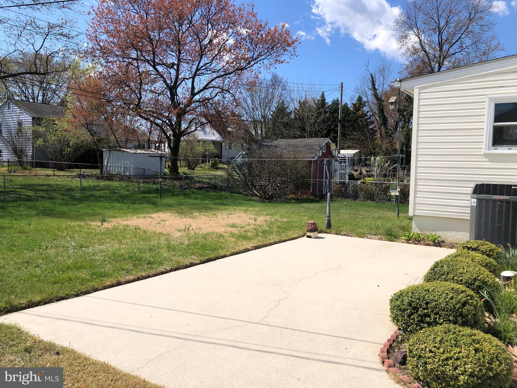 403 Ridgely Road Glen Burnie, MD 21061 - Photo 14 of 16 Backyard Patio, Fully Fenced Yard