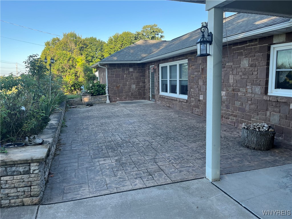 6293 East Lake Road Burt, NY 14028 - Photo 6 of 34 Front patio