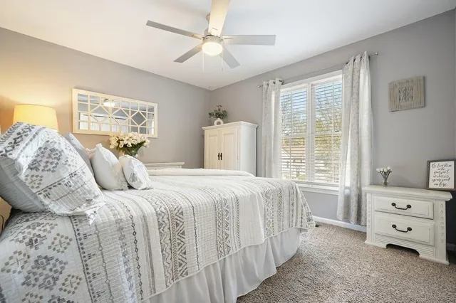a bathroom with a sink vanity and a mirror
