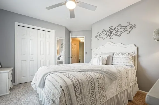 a bathroom with a sink vanity and mirror