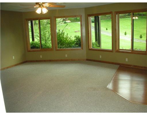 166 Temple Road Georgetown, PA 15043 - Photo 14 of 18 Family Room. 20x18 room space. Ground level patio/porch area, walk in from garage or patio.