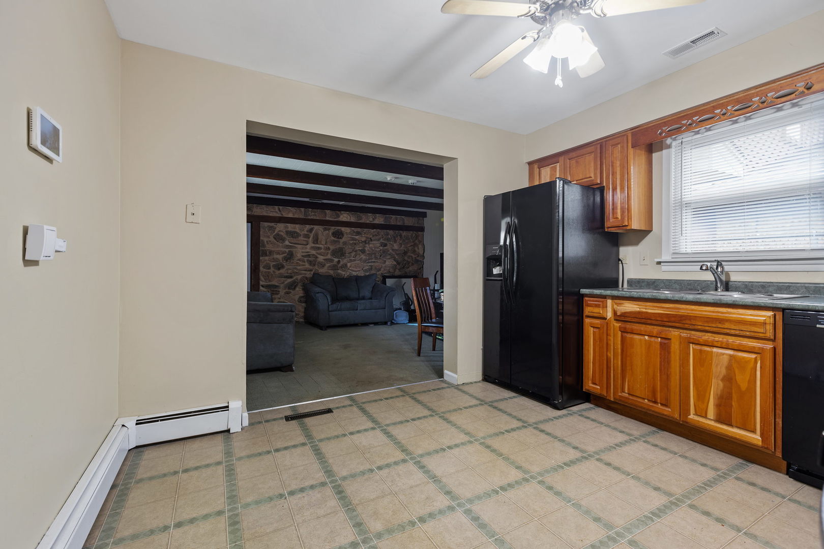 6193 Washington Street Chicago Ridge, IL 60415 - Photo 3 of 14 a kitchen with stainless steel appliances a refrigerator and cabinets