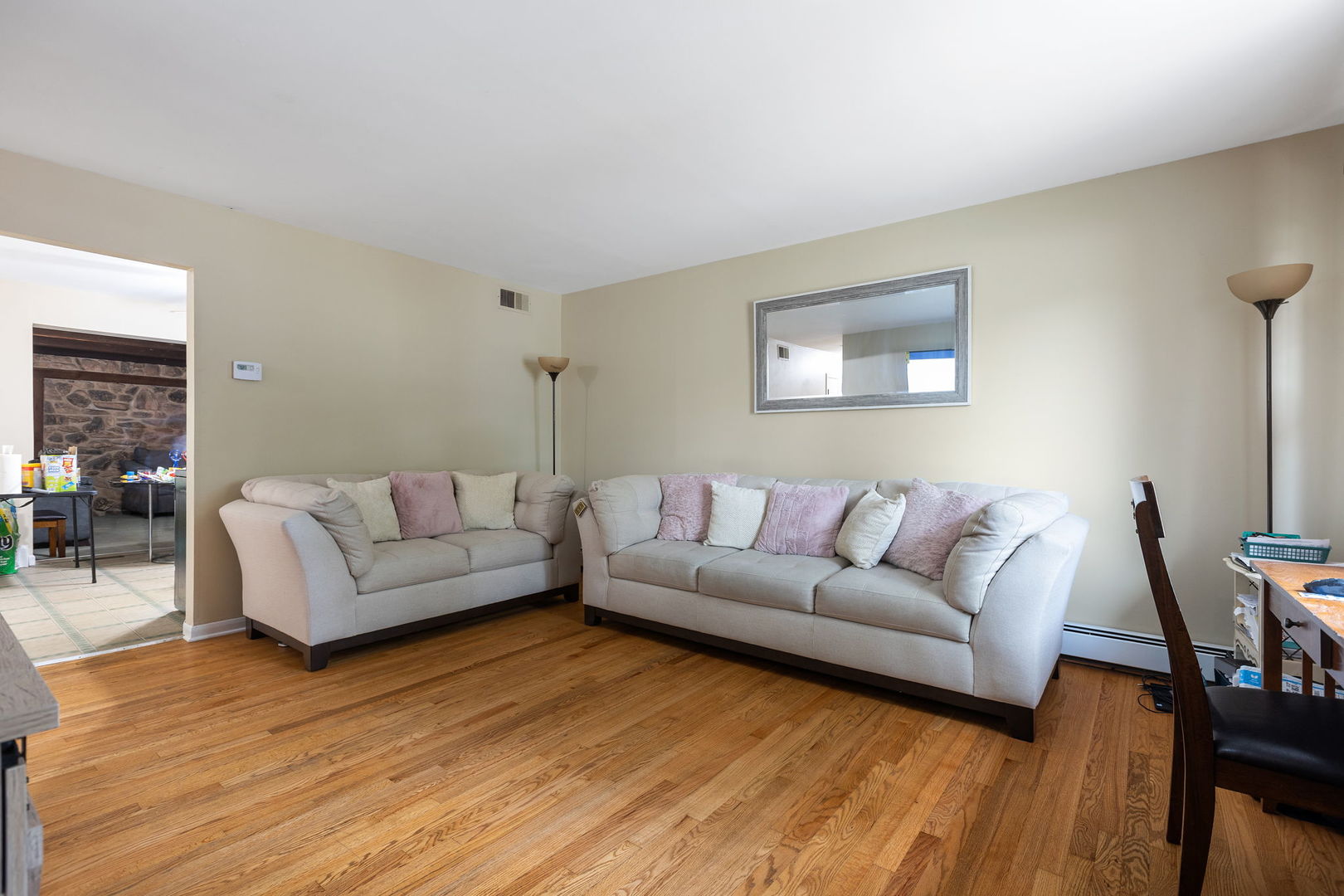 6193 Washington Street Chicago Ridge, IL 60415 - Photo 4 of 14 a living room with furniture and a wooden floor