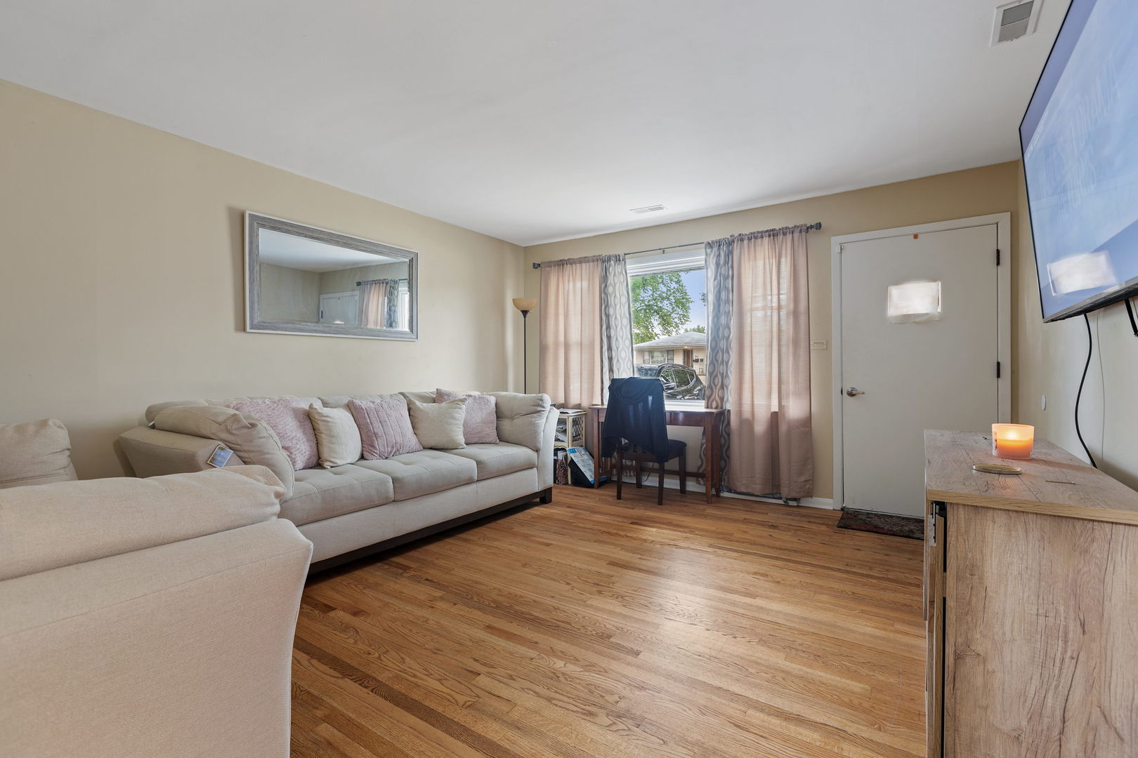 6193 Washington Street Chicago Ridge, IL 60415 - Photo 5 of 14 a living room with furniture and a window