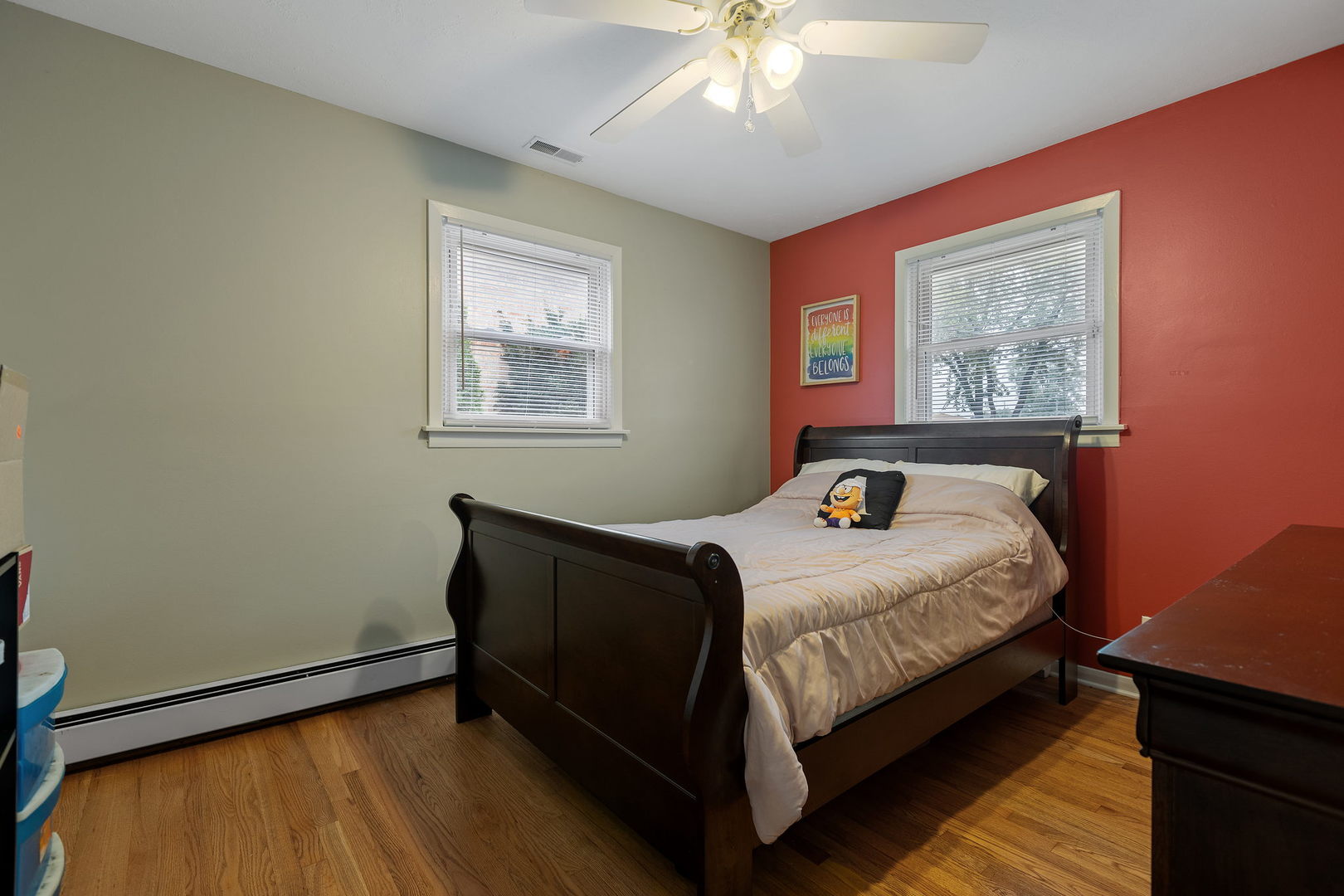 6193 Washington Street Chicago Ridge, IL 60415 - Photo 7 of 14 a bed sitting in a bedroom next to a window