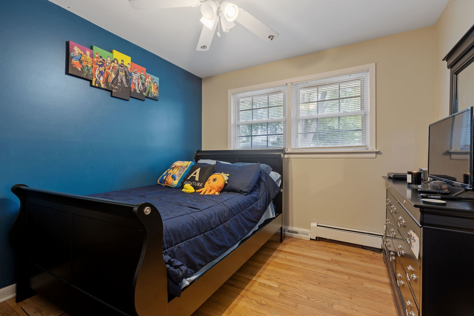 6193 Washington Street Chicago Ridge, IL 60415 - Photo 8 of 14 a bed sitting in a bedroom next to a window