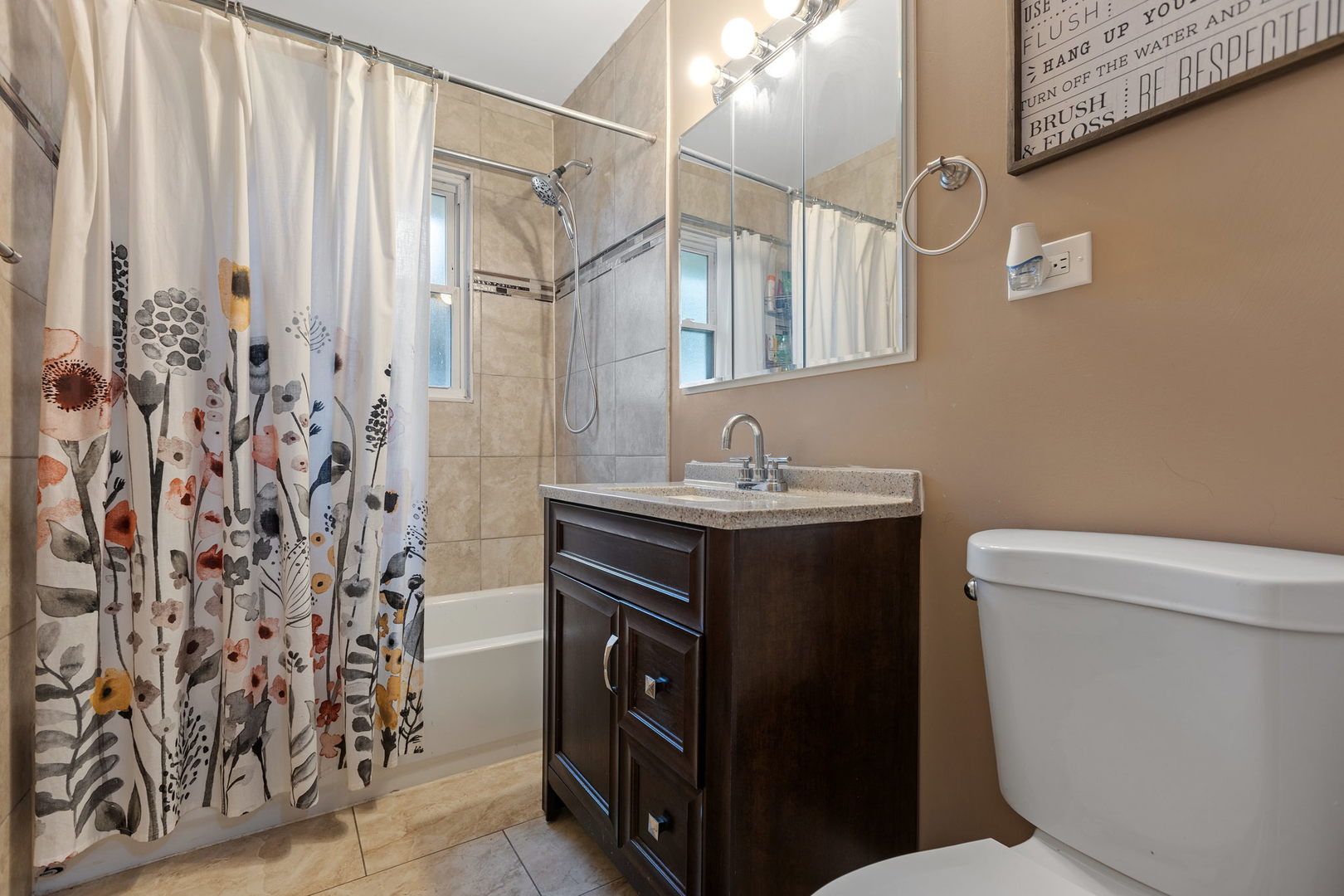 6193 Washington Street Chicago Ridge, IL 60415 - Photo 9 of 14 a bathroom with a double vanity sink toilet and shower