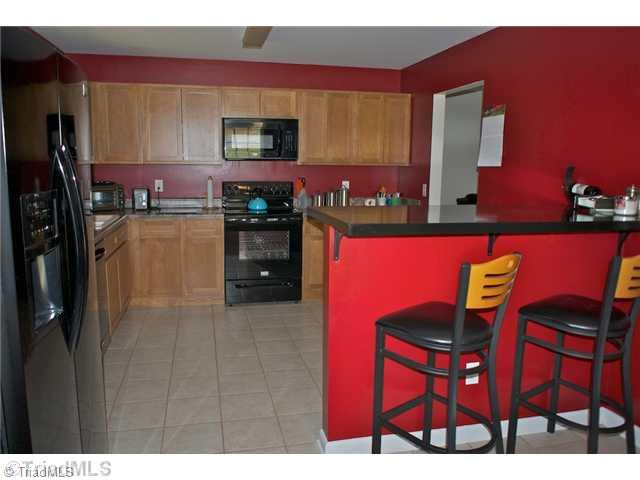 5754 Davis Road Walkertown, NC 27051 - Photo 2 of 16 Kitchen. large kitchen with prep bar/island and breakfast area