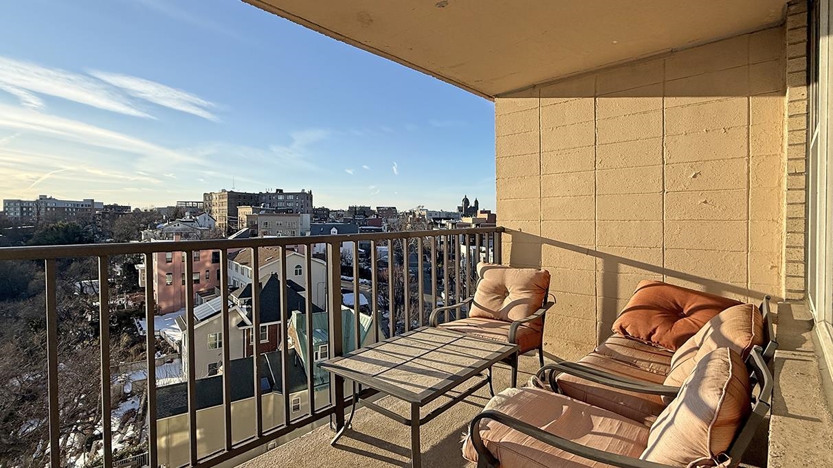 380 Mountain Road, Unit 714 Union City, NJ 07087 - Photo 11 of 31 a roof deck with wooden floor and city view