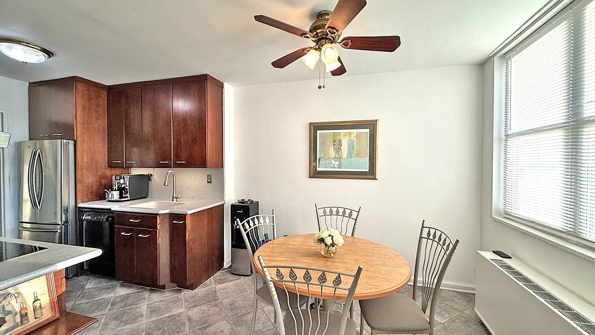 380 Mountain Road, Unit 714 Union City, NJ 07087 - Photo 5 of 31 a view of a dining room with furniture