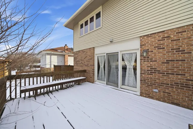 a view of a house with iron fence