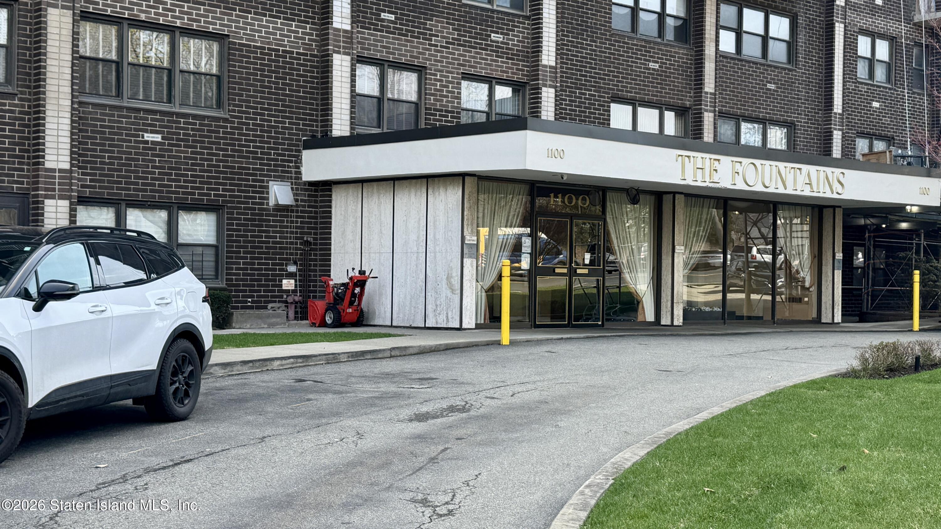 1100 Clove Road, Unit 2B Staten Island, NY 10301 - Photo 3 of 52 a car parked in front of a building