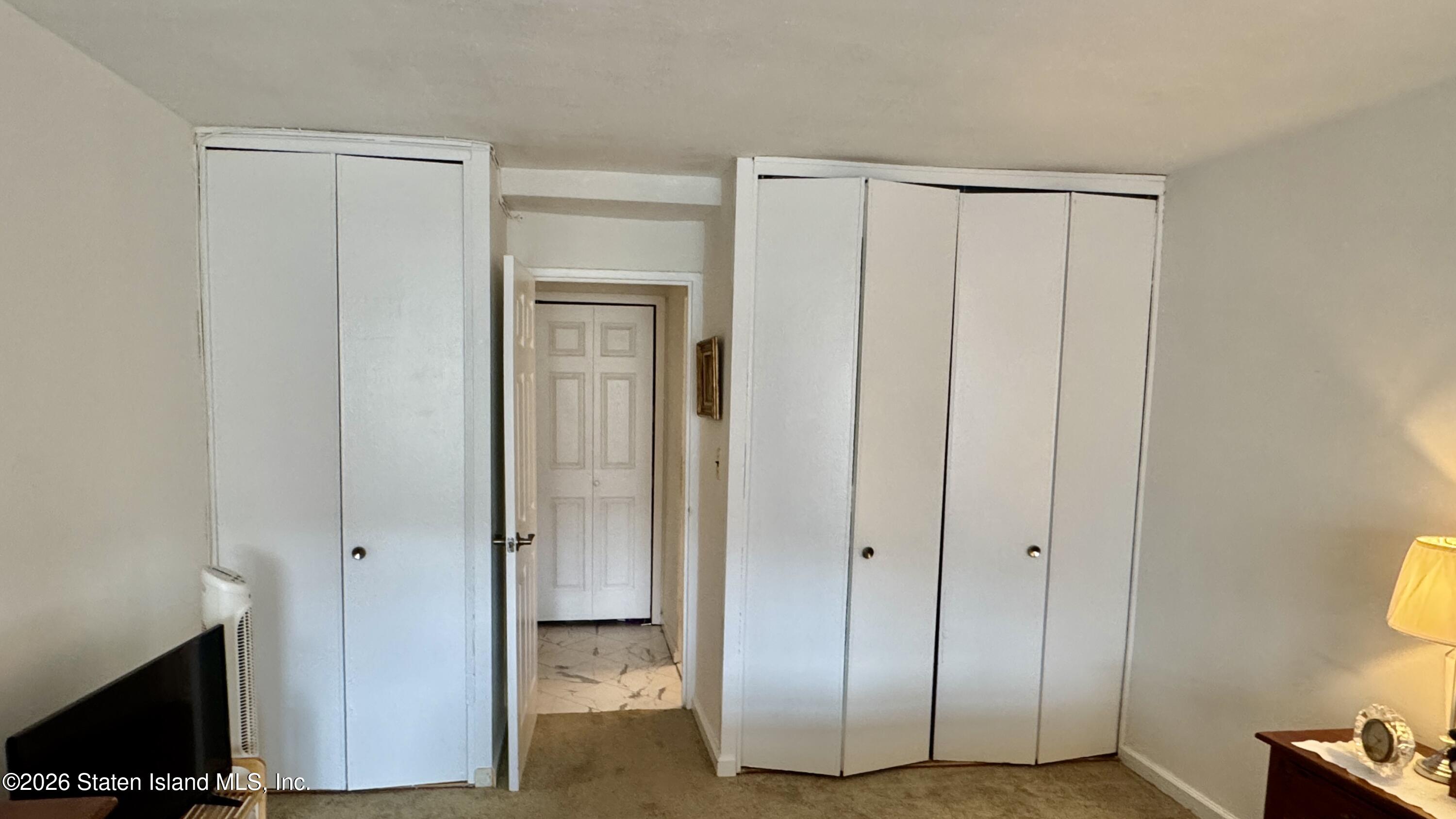 1100 Clove Road, Unit 2B Staten Island, NY 10301 - Photo 34 of 52 a view of an entryway with wooden floor