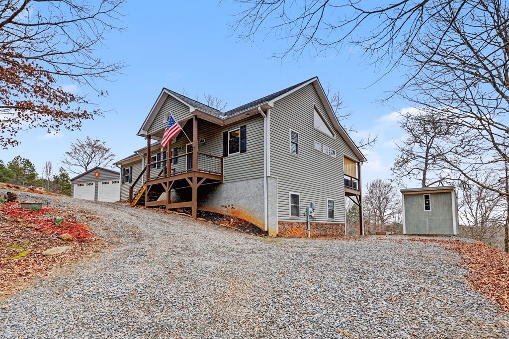 340 Country Mountain Ridge Drive Murphy, NC 28906 - Photo 23 of 73 a view of a house with a yard