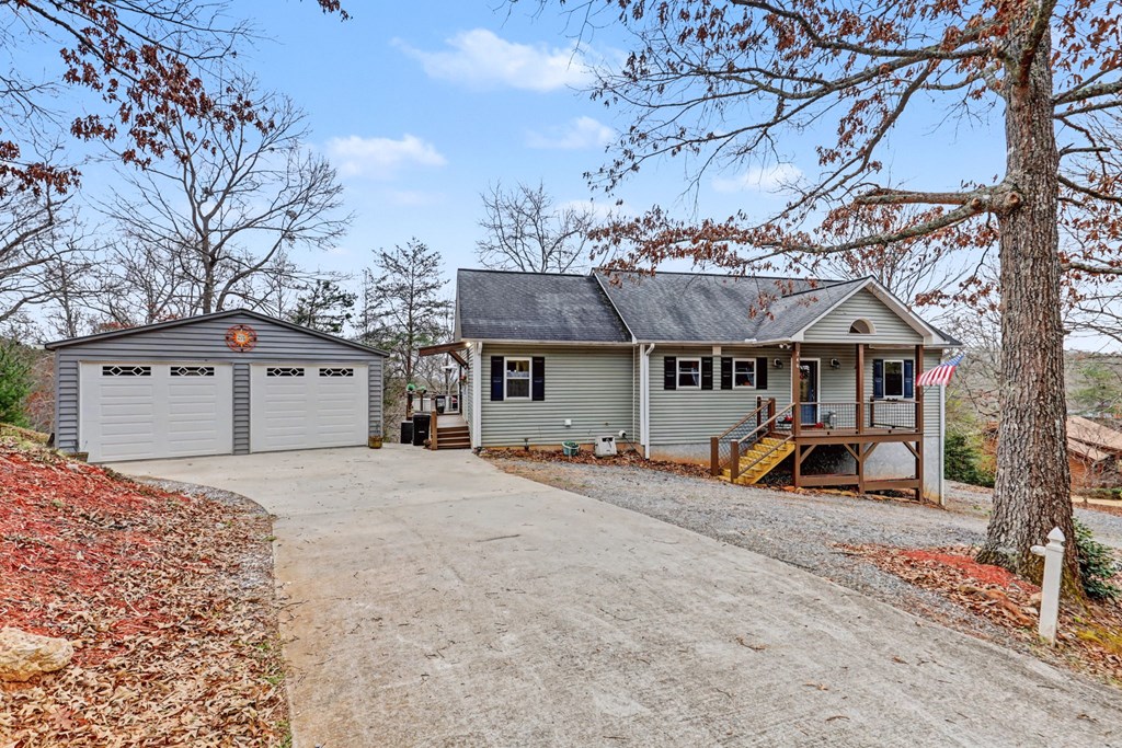 340 Country Mountain Ridge Drive Murphy, NC 28906 - Photo 24 of 73 a view of house with outdoor space and sitting area