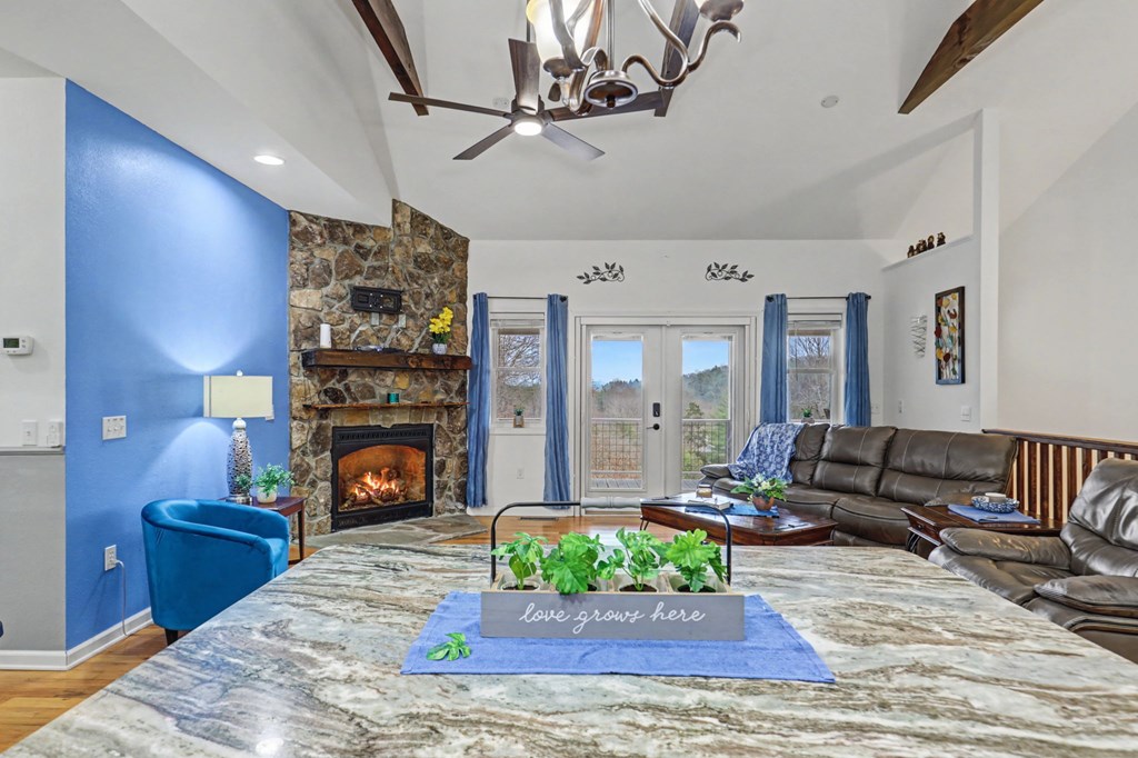 340 Country Mountain Ridge Drive Murphy, NC 28906 - Photo 37 of 73 a living room with furniture and a fireplace