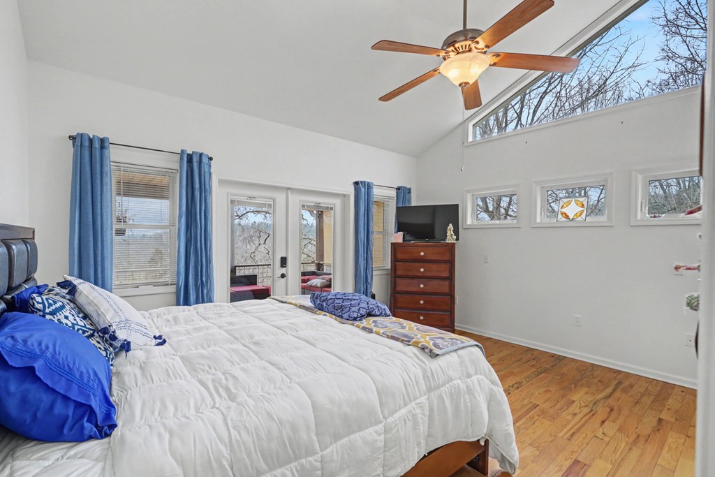 340 Country Mountain Ridge Drive Murphy, NC 28906 - Photo 39 of 73 a bedroom with a bed dresser and a window