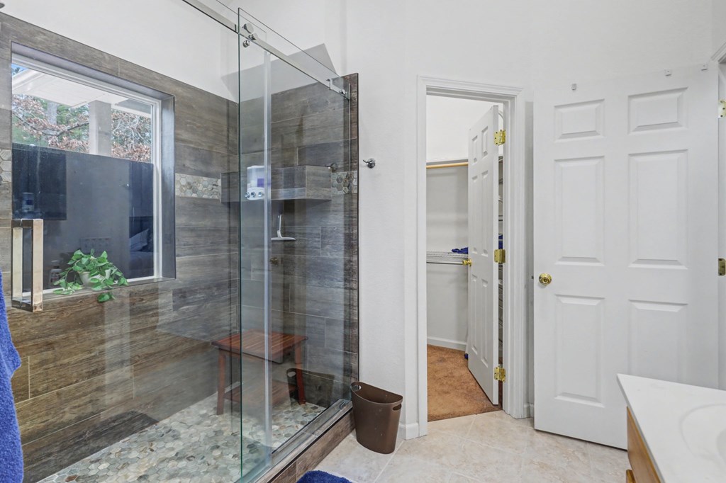 340 Country Mountain Ridge Drive Murphy, NC 28906 - Photo 52 of 73 a bathroom with a shower and a sink