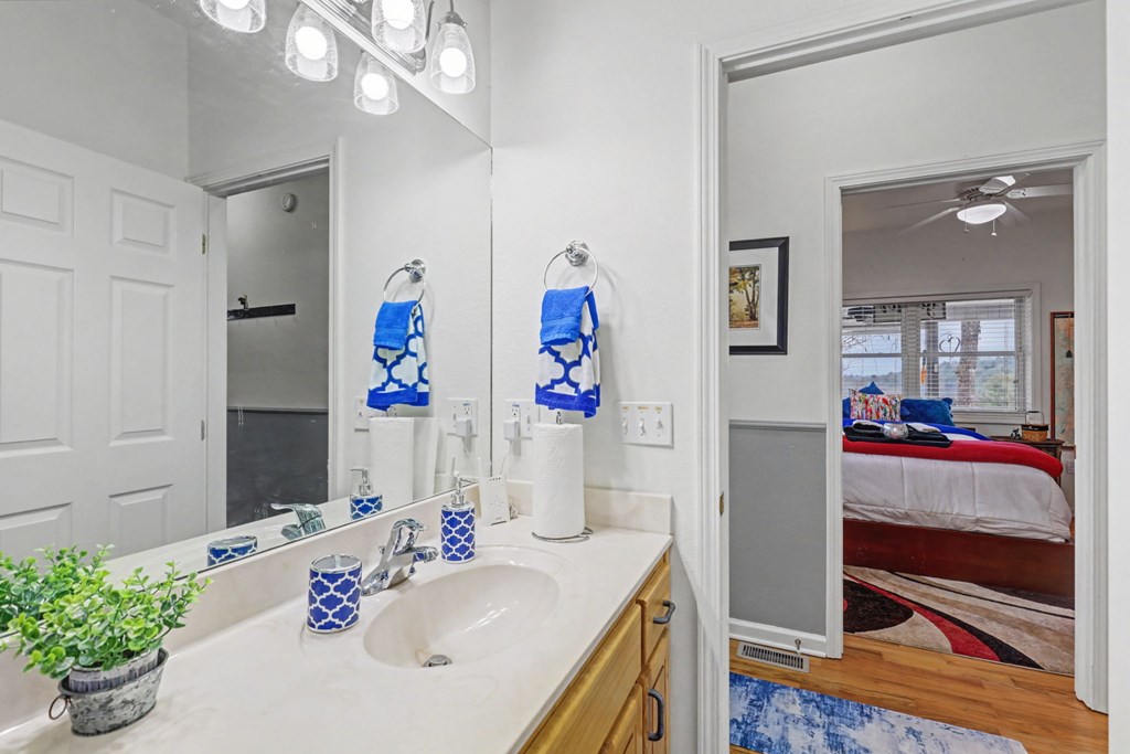 340 Country Mountain Ridge Drive Murphy, NC 28906 - Photo 62 of 73 a bathroom with a sink and a mirror