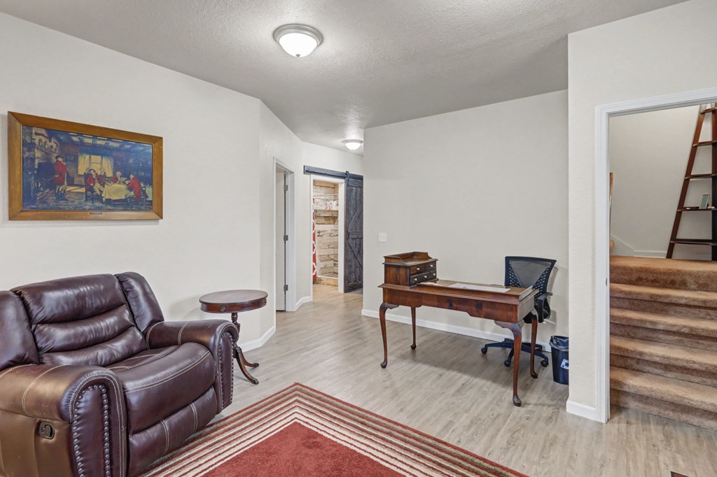 340 Country Mountain Ridge Drive Murphy, NC 28906 - Photo 65 of 73 a living room with furniture and a wooden floor