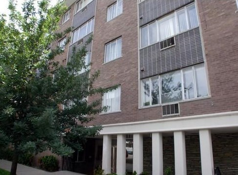 7120 North Sheridan Road, Unit 408 Chicago, IL 60626 - Photo 1 of 1 a front view of a house with balcony