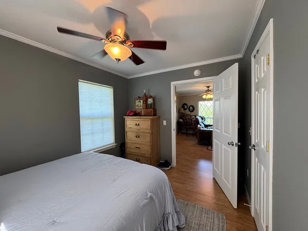a living room with furniture a window and appliances