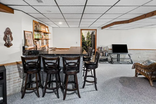 a living room with furniture and a table