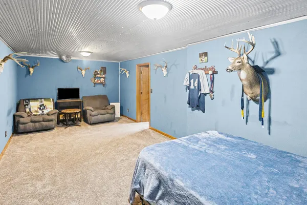 a living room with furniture and a rug