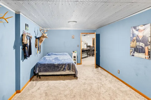 an aerial view of a house with a ocean view