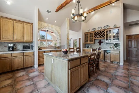 a view of a livingroom with furniture window and wooden floor