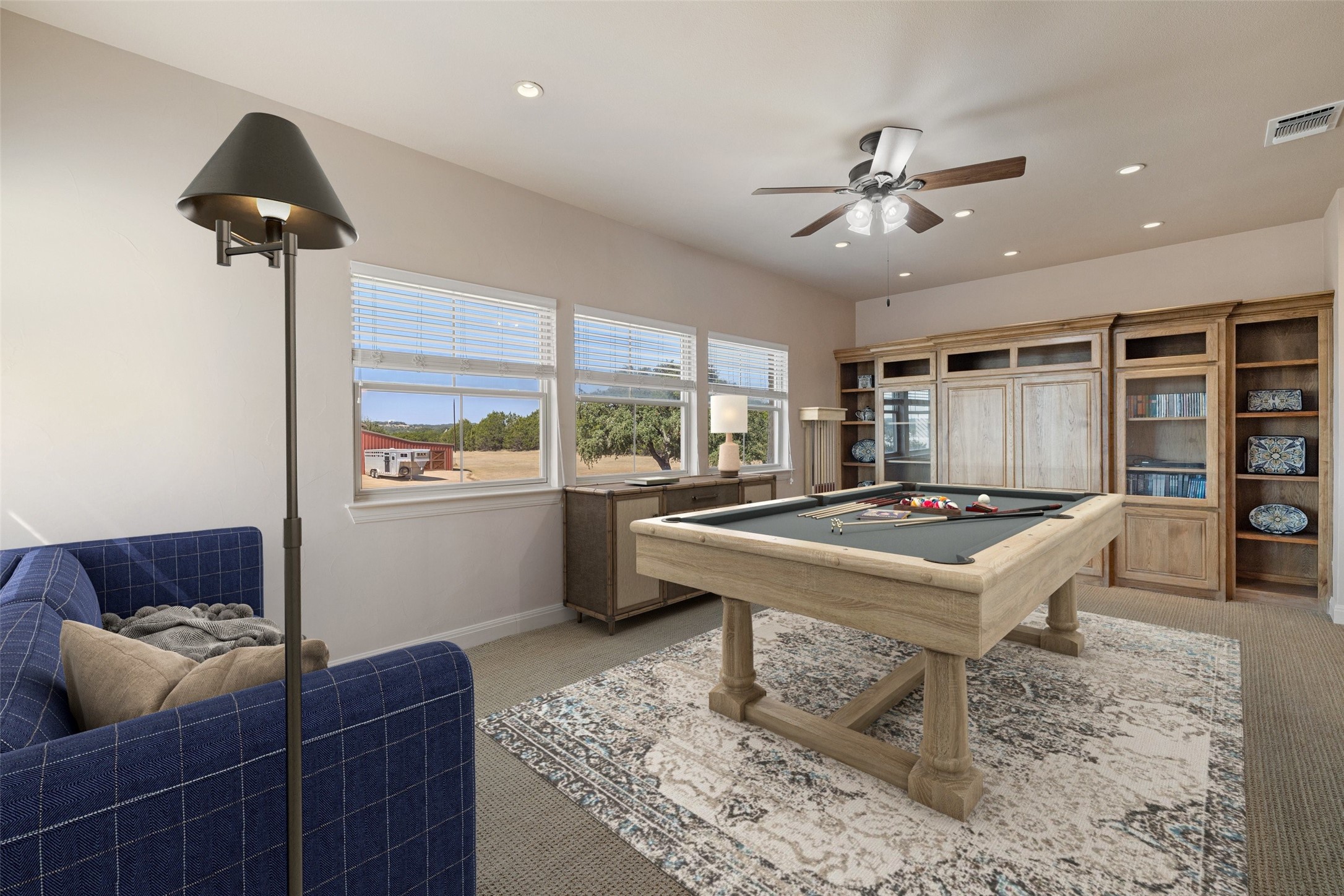 1120 Canyon View Road Dripping Springs, TX 78620 - Photo 22 of 40 a room with furniture and a table