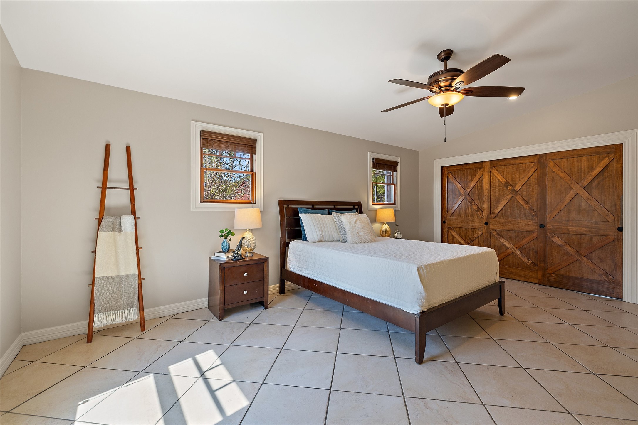 1120 Canyon View Road Dripping Springs, TX 78620 - Photo 29 of 40 a bedroom with a bed and window