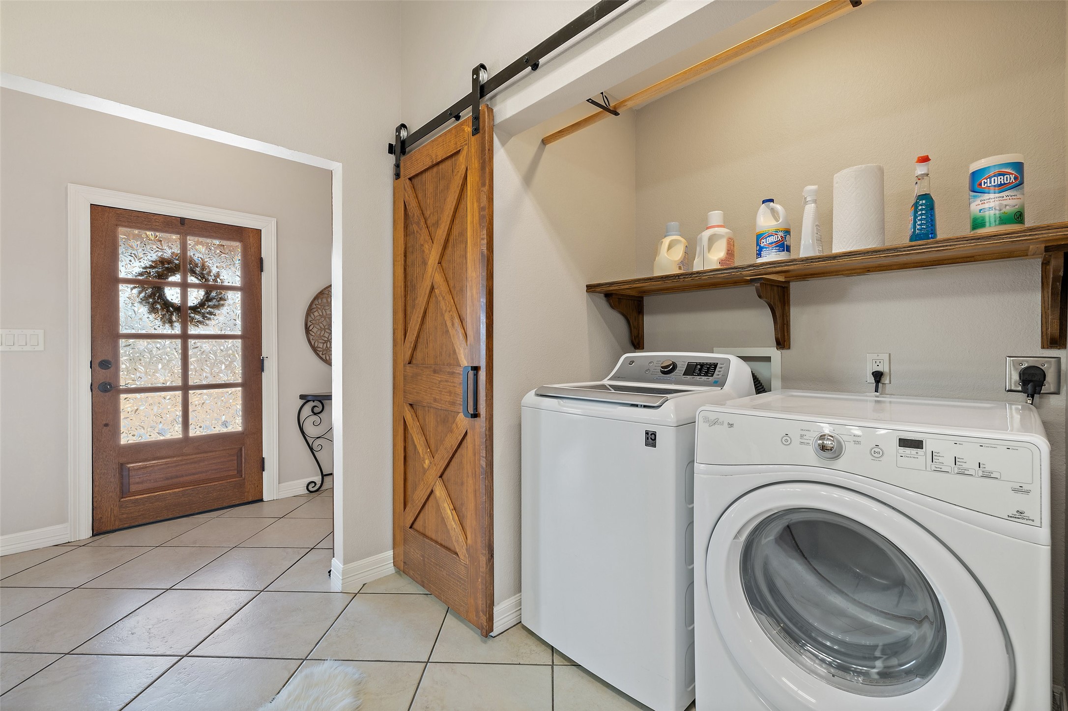 1120 Canyon View Road Dripping Springs, TX 78620 - Photo 32 of 40 a view of storage and utility room with washer and dryer