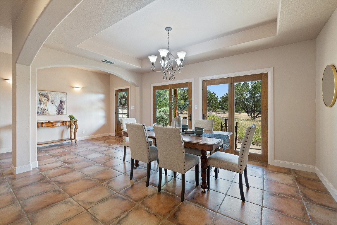 1120 Canyon View Road Dripping Springs, TX 78620 - Photo 6 of 40 a view of a dining room with furniture window and outside view
