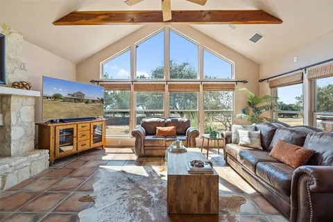 a kitchen that has a lot of cabinets in it and a sink